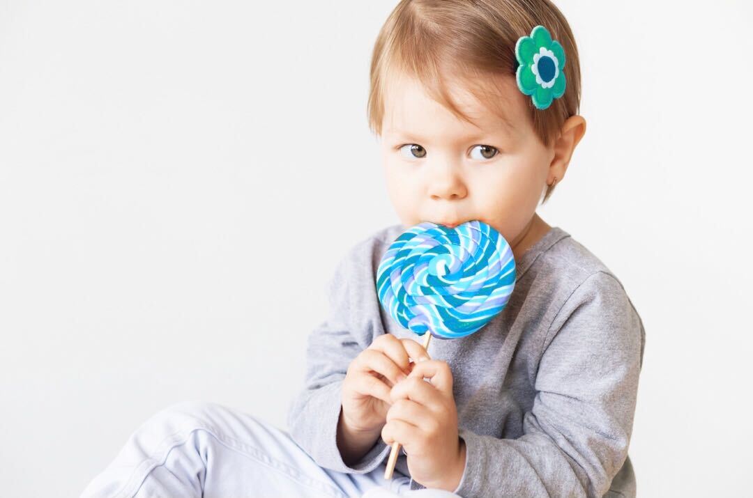 toddler eating sugar baby eating sugar